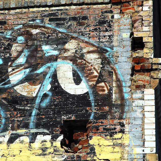 Graffiti on brick wall, Western Avenue, near Second Street 