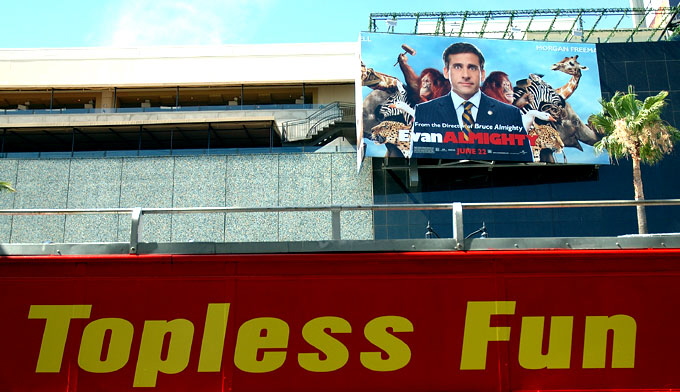 A tour bus at Hollywood and Highland, just across from the Kodak Theater where they hold the Oscars, and a billboard 