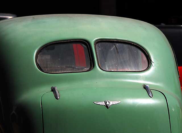 Trunk lid of old car in a repair lot on the northwest corner of Robertson and Charleville at the edge of Beverly Hills