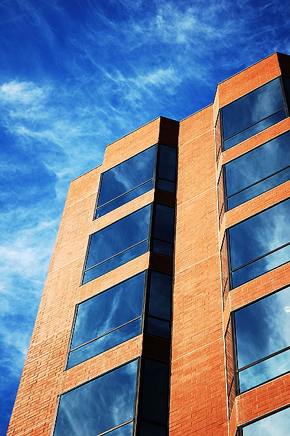 Clouds reflected in glass, office building on the Sunset Strip, West Hollywood 